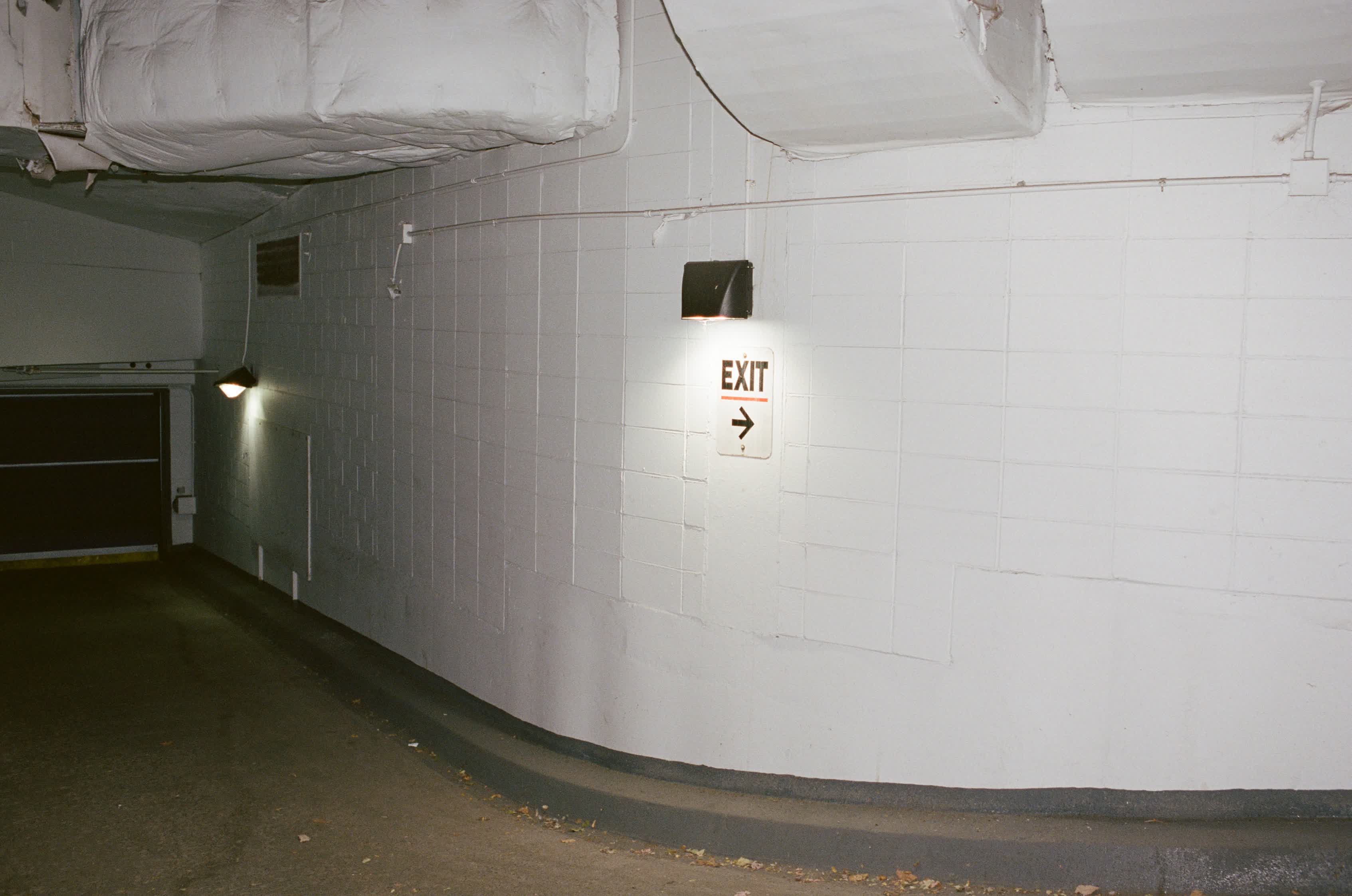 Garage ramp and exit corridor inside 921 Marquette